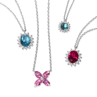 Blue Topaz & Ruby Oval Halo Set